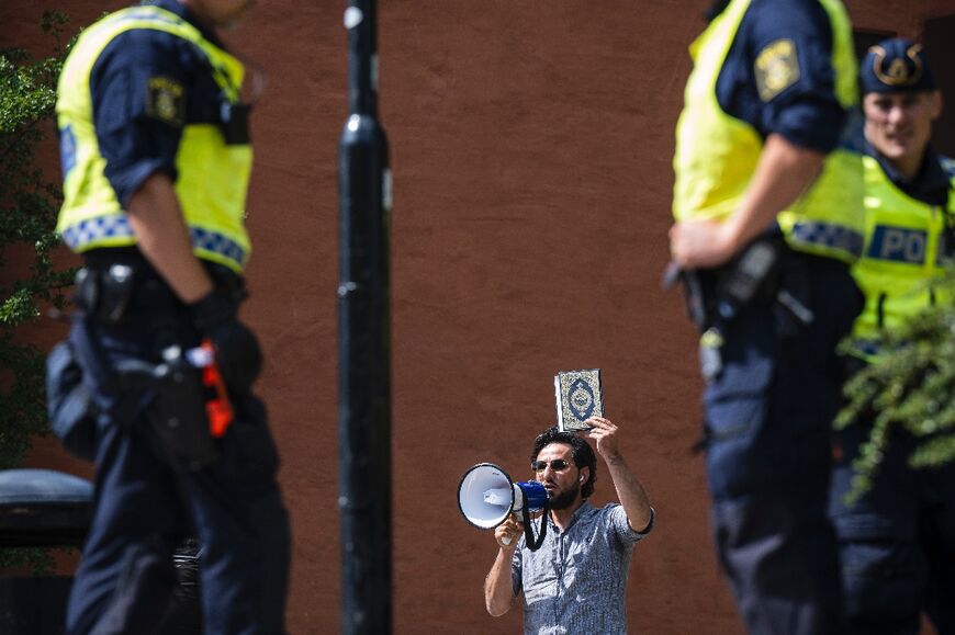 Iraqi Salwan Momika set on fire a Koran outside a Stockholm after  police granted him a permit to protest in line with free-speech protections