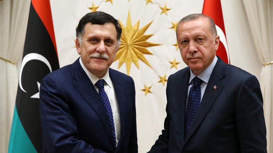 ANKARA, TURKEY - MARCH 20: President of Turkey Recep Tayyip Erdogan (R) receives Chairman of the Presidential Council of Libya Fayez al-Sarraj (L) at Presidential Complex in Ankara, Turkey on March 20, 2019.
 (Photo by Murat Kula/Anadolu Agency/Getty Images)