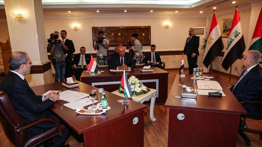 (L to R) Jordanian Foreign Minister Ayman Safadi, Egyptian Foreign Minister Sameh Shoukry, and Iraqi Foreign Minister Mohammed Ali Hakim meet in the Iraqi capital Baghdad on August 4, 2019. (Photo by SABAH ARAR / AFP)        (Photo credit should read SABAH ARAR/AFP via Getty Images)