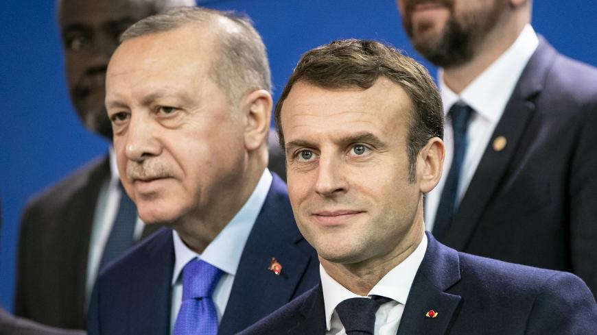 BERLIN, GERMANY - JANUARY 19: French President Emmanuel Macron (R) and Turkish President Recep Tayyip Erdogan (L) are pictured during a family picture at the Chancellery on January 19, 2020 in Berlin, Germany. Leaders of nations and organizations linked to the current conflict are meeting to discuss measures towards reaching a consensus between the warring sides and ending hostilities. (Photo by Emmanuele Contini/Getty Images)