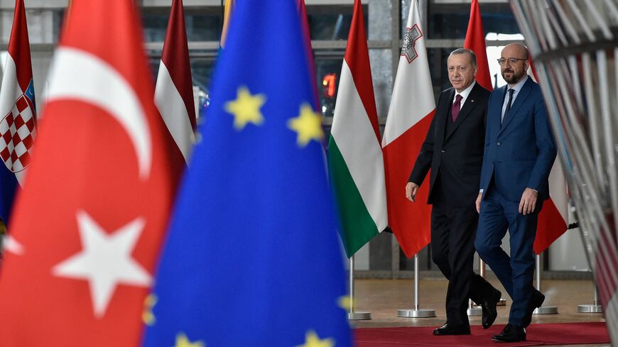 EU Council President Charles Michel (R) arrives with Turkish President Recep Tayyip Erdogan before a meeting with European Commission President Ursula von der Leyen at the EU headquarters in Brussels on March 9, 2020. (Photo by JOHN THYS / AFP) (Photo by JOHN THYS/AFP via Getty Images)