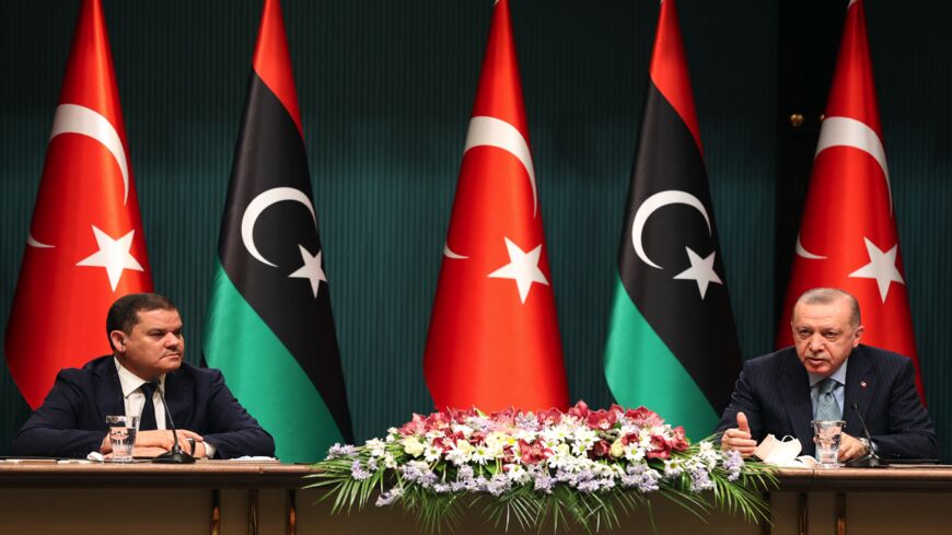 Turkish President Recep Tayyip Erdogan (R) and Libyan GNU Prime Minister Abdul Hamid Dbeibah at the Presidential Palace in Ankara, April 12, 2021.