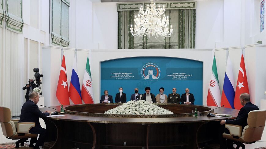 Russian President Vladimir Putin (L), Iranian President Ebrahim Raisi (C) and Turkish President Recep Tayyip Erdogan.