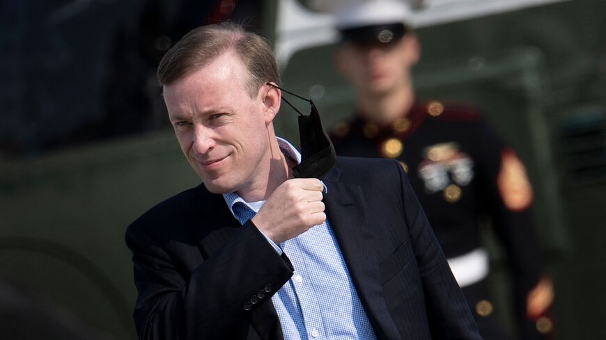 Jake Sullivan, Assistant to the President and National Security Advisor, follows US President Joe Biden to Air Force One at Andrews Air Force Base September 17, 2022, in Maryland. They will travel to London to attend the funeral of Queen Elizabeth II. (Photo by Brendan Smialowski / AFP) (Photo by BRENDAN SMIALOWSKI/AFP via Getty Images)