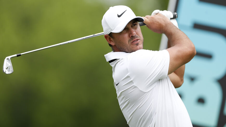 Brooks Koepka of Smash GC hits a tee shot on the sixth hole during Day Three of the LIV Golf Invitational - Tulsa at Cedar Ridge Country Club in Broken Arrow, Oklahoma, May 14, 2023.