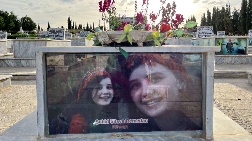 Slava Ramadan’s grave at the Rustem Cudi graveyard for martyrs outside Al Darbasiyah, April 26, 2023. (photo by Amberin Zaman)