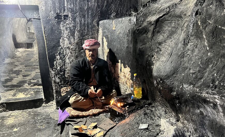 A man inside Lalish, the Yazidis’ holiest shrine in Dahuk, Iraq, Nov. 18, 2022. (Amberin Zaman/Al-Monitor)