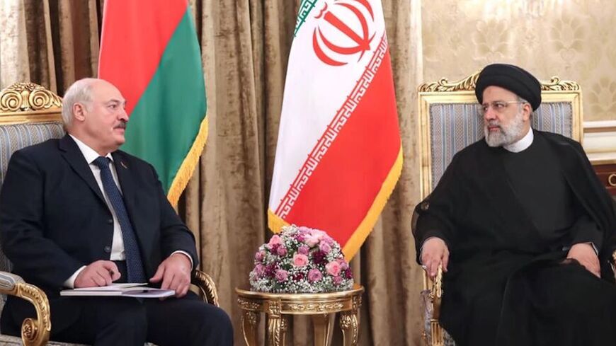 Belarusian President Alexander Lukashenko (L) meets Iranian President Ibrahim Raisi in Tehran on March 13, 2023.