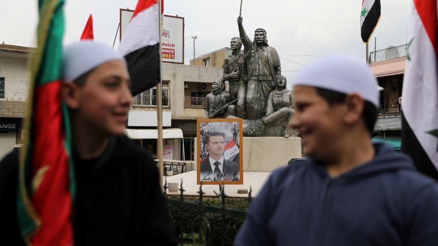 Druze people take part in a rally over U.S. President Donald Trump's support for Israeli sovereignty over the Golan Heights, in Majdal Shams near the ceasefire line between Israel and Syria in the Israeli occupied Golan Heights March 23, 2019 REUTERS/Ammar Awad - RC1883F0B370