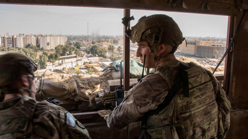 U.S. Army soldiers keep watch on the U.S. embassy compound in Baghdad, Iraq January 1, 2020.  DoD/Lt. Col. Adrian Weale/Handout via REUTERS.  THIS IMAGE HAS BEEN SUPPLIED BY A THIRD PARTY.     TPX IMAGES OF THE DAY - RC217E9GTDSL