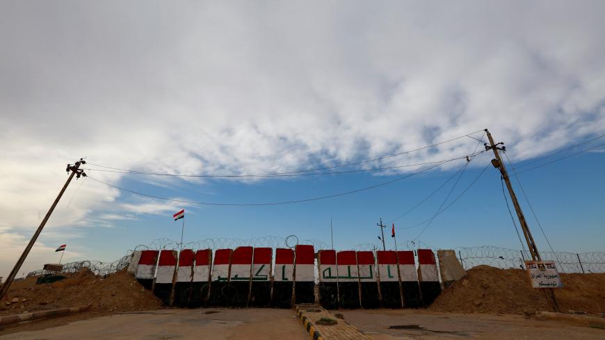 The al-Qaim gate is closed at the border between Iraq and Syria at  al-Qaim in Iraq, November 27, 2018. Picture taken November 27, 2018.  REUTERS/Alaa al-Marjani - RC1669CDDD20