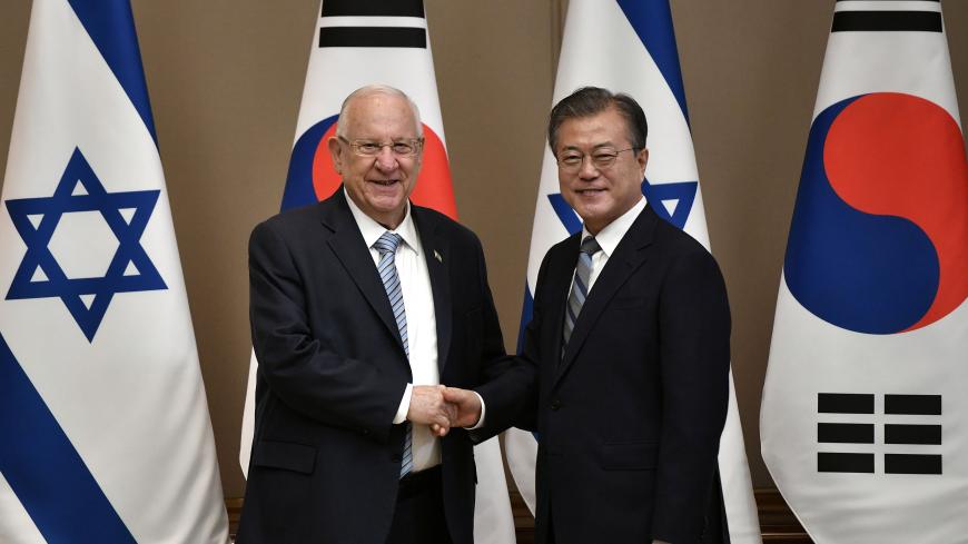 South Korean President Moon Jae-in (R) shakes hands with Israeli President Reuven Rivlin (L) during their meeting at the presidential Blue House in Seoul, South Korea July 15, 2019. Jung Yeon-je/Pool via REUTERS - RC11CC393B00